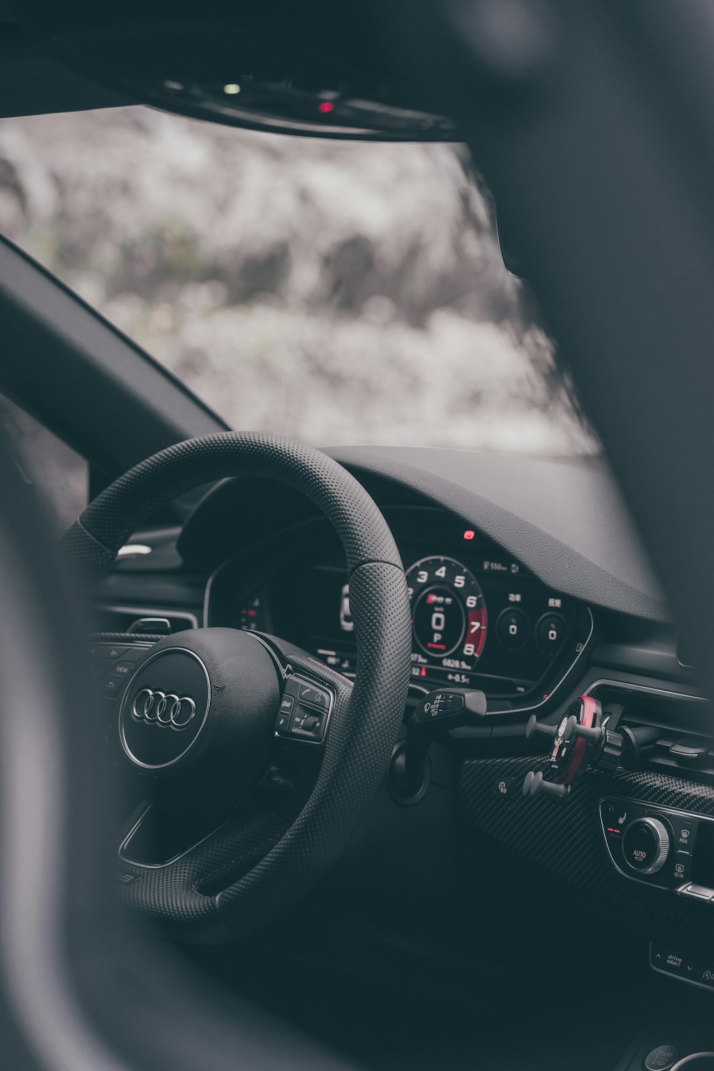 a steering wheel and dashboard of a car