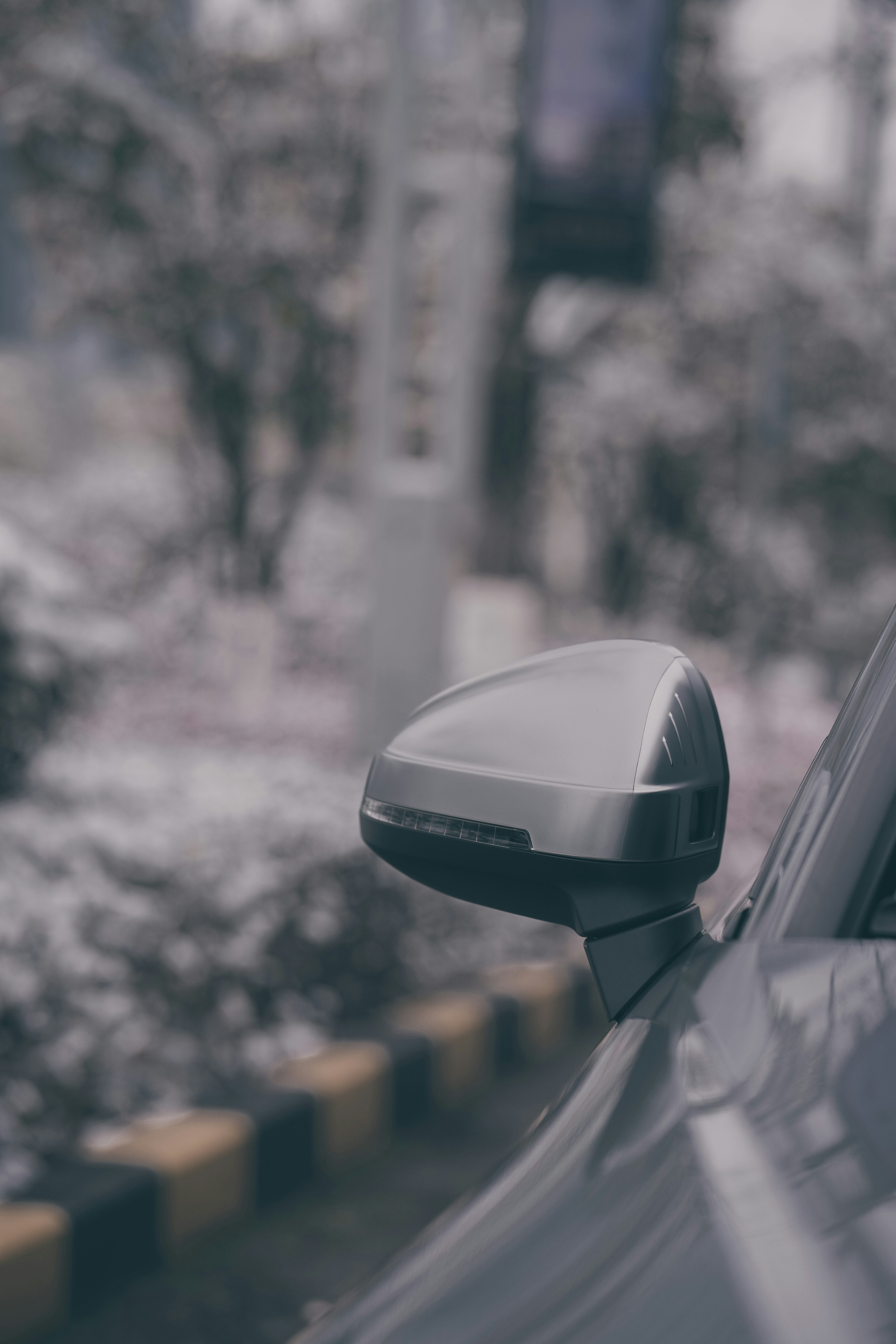 a side view mirror on the side of a car