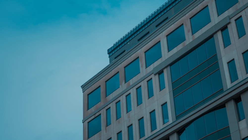 a tall building with a clock on the side of it