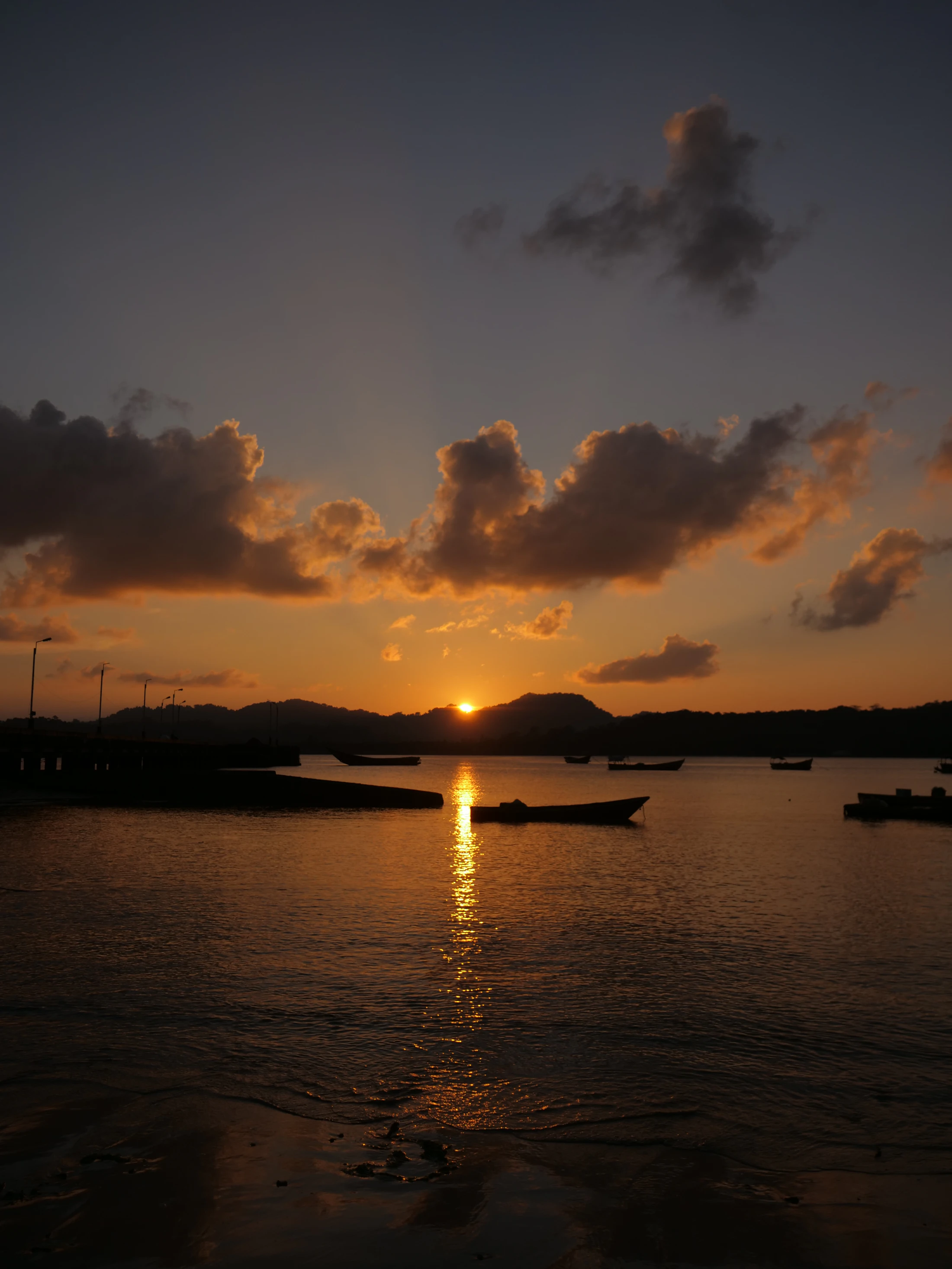Sun setting behind islands in the Andaman Sea