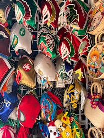 a bunch of hats that are on a rack