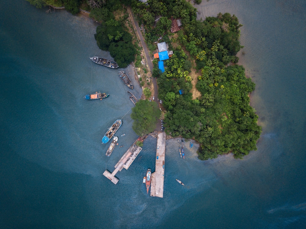 a small island with several boats in the water