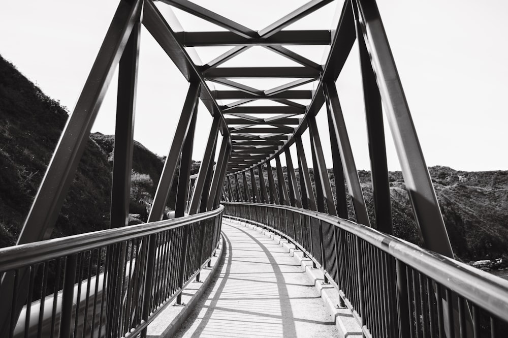 a black and white photo of a bridge