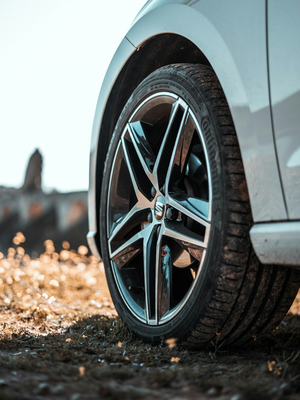 a close up of a tire on a car