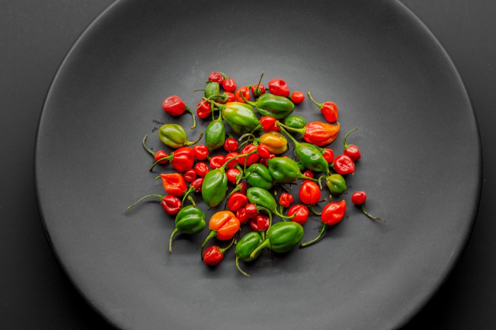a plate with a bunch of peppers on it