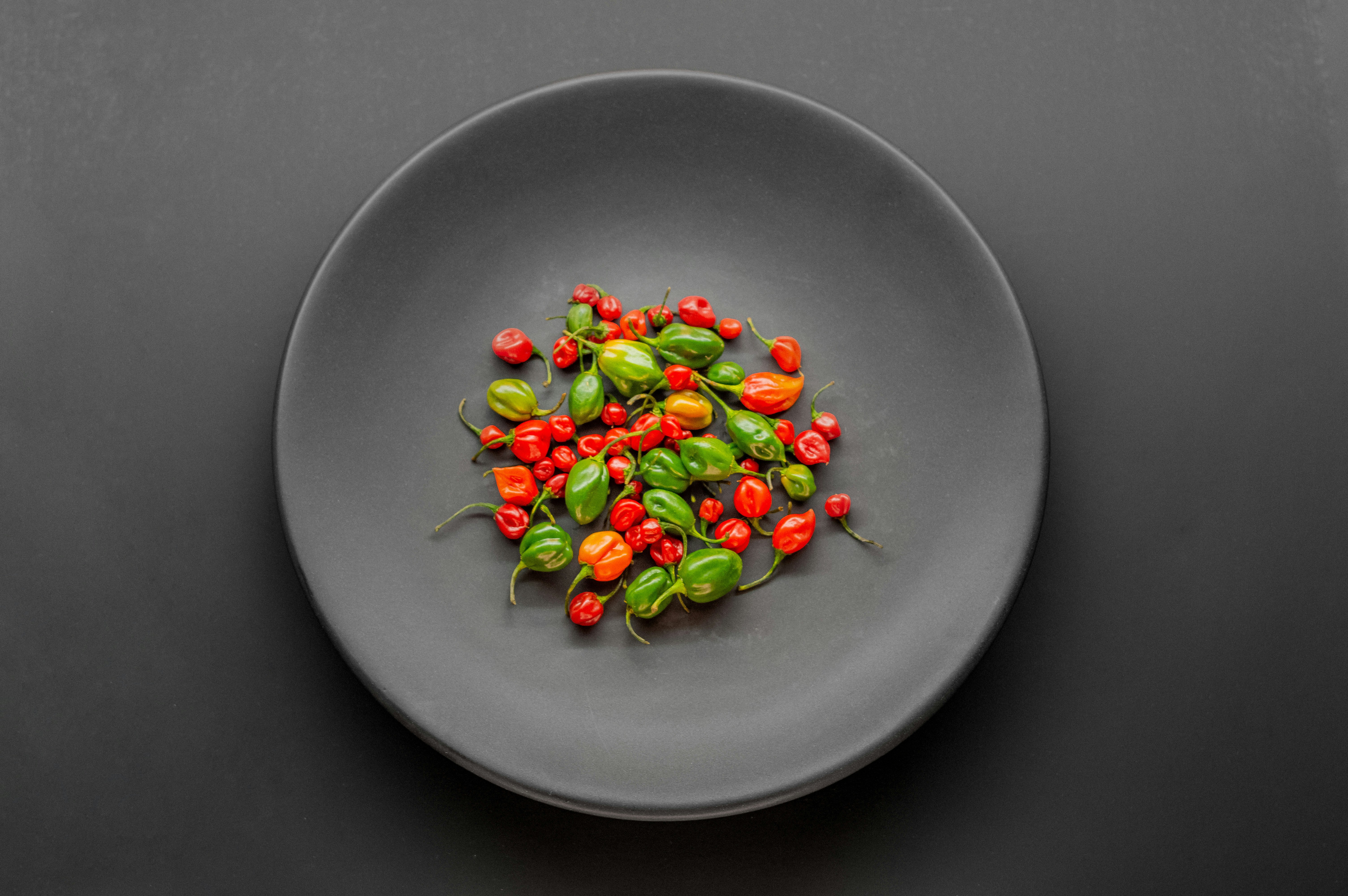a plate with a bunch of peppers on it
