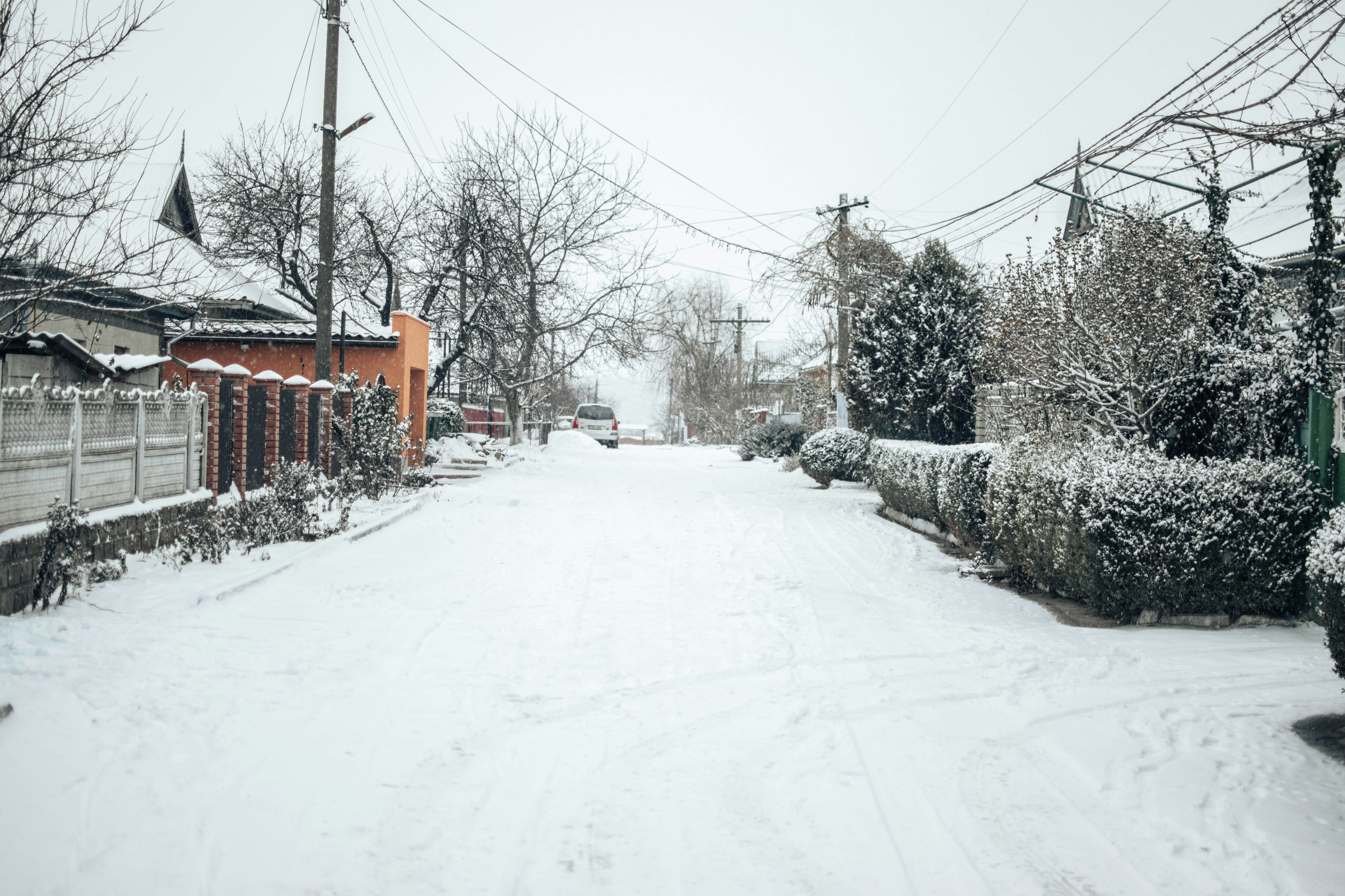 a snowy Pacific Northwest neighborhood street - same day heat pump repair olympia
