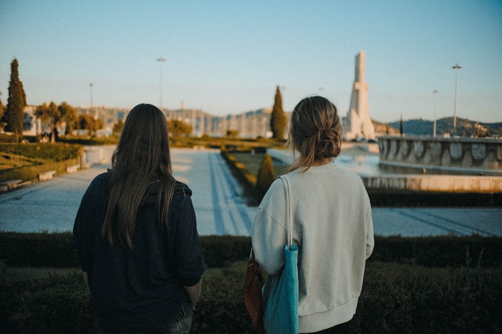 a couple of women standing next to each other