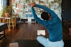 a man doing yoga in a living room
