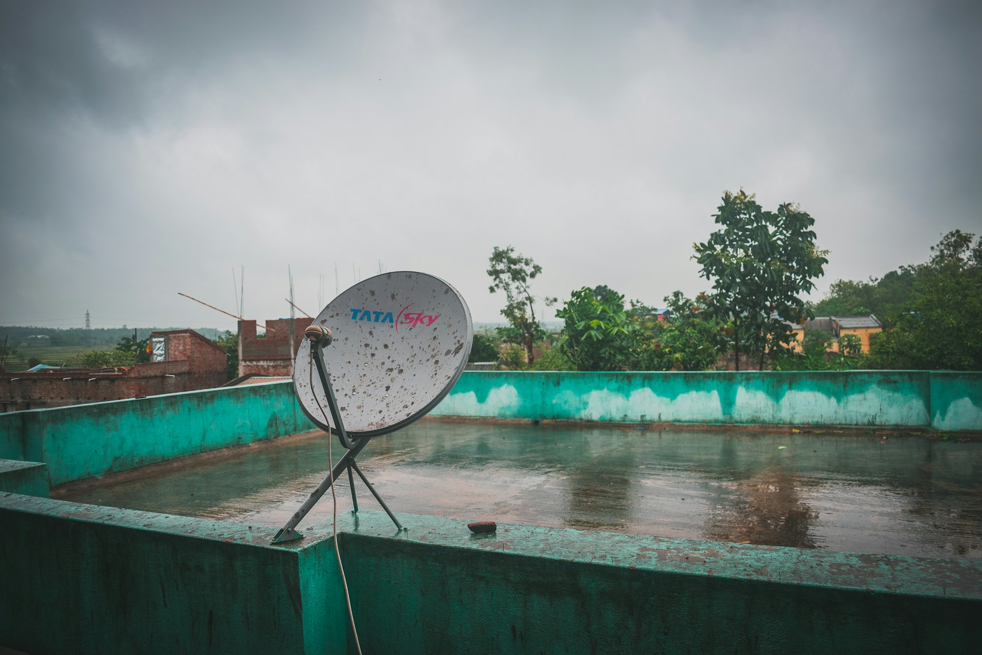 woman wearing yellow long-sleeved dress under white clouds and blue sky during daytime