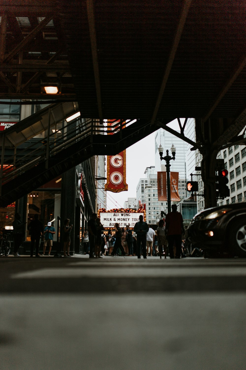 a car stopped at a train station