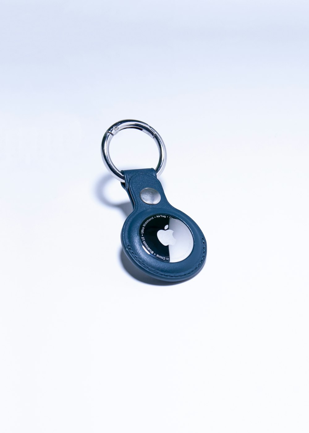 a keychain with a hole in the middle of it