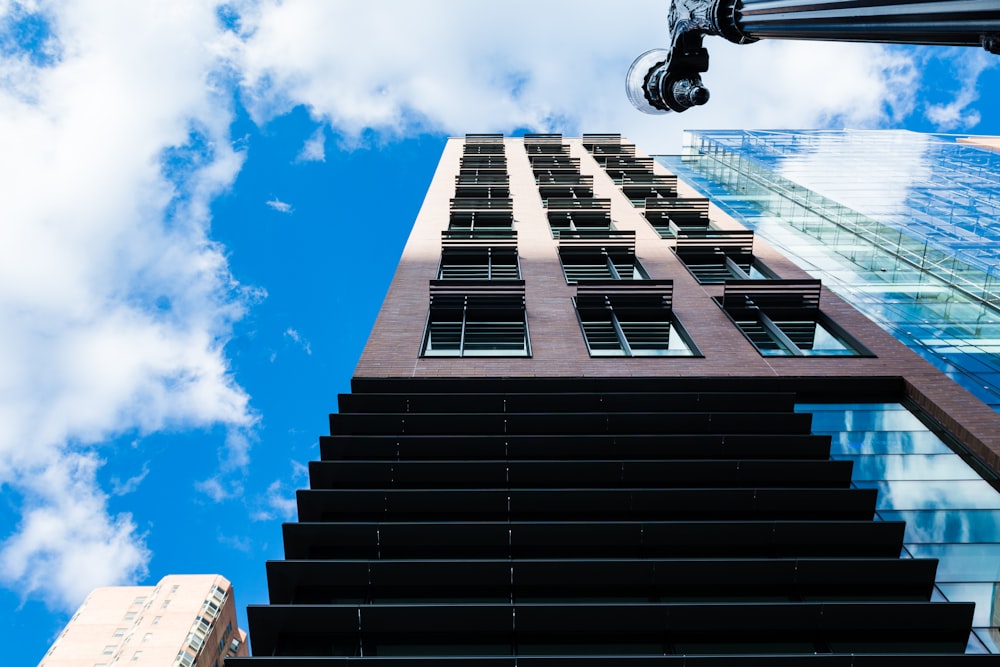 a tall building with a sky background