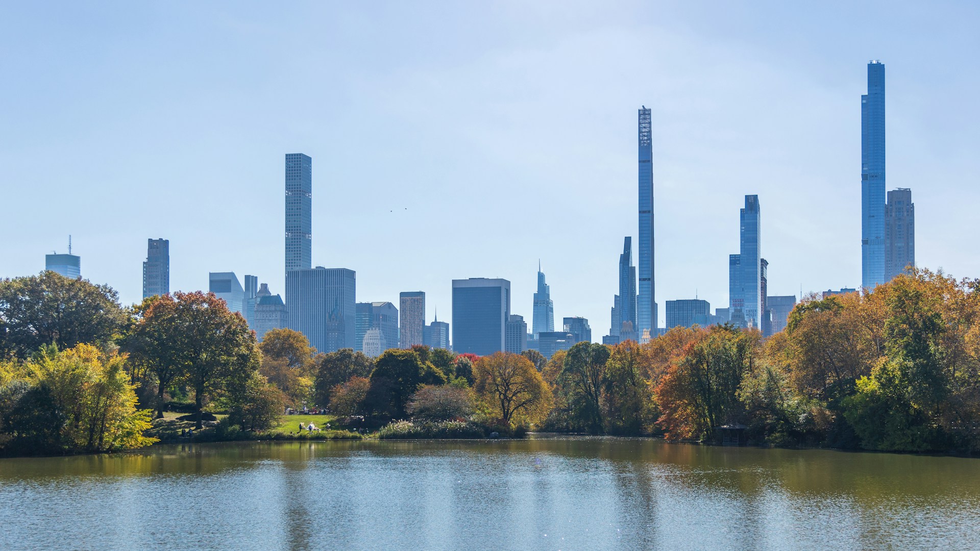 a view of a city from across a lake