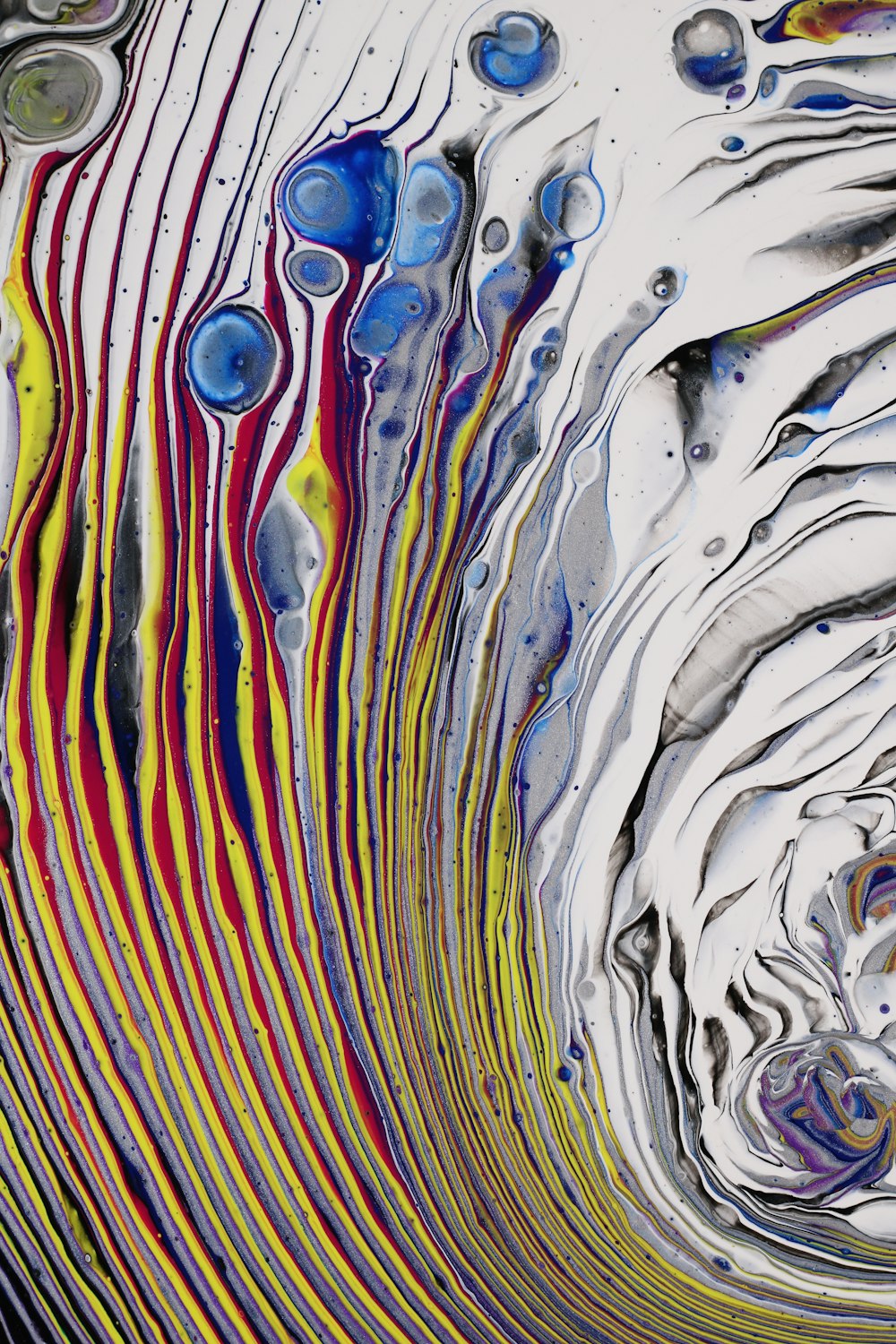 a close up of an abstract painting with colors