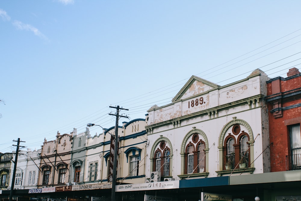 a row of buildings on a city street