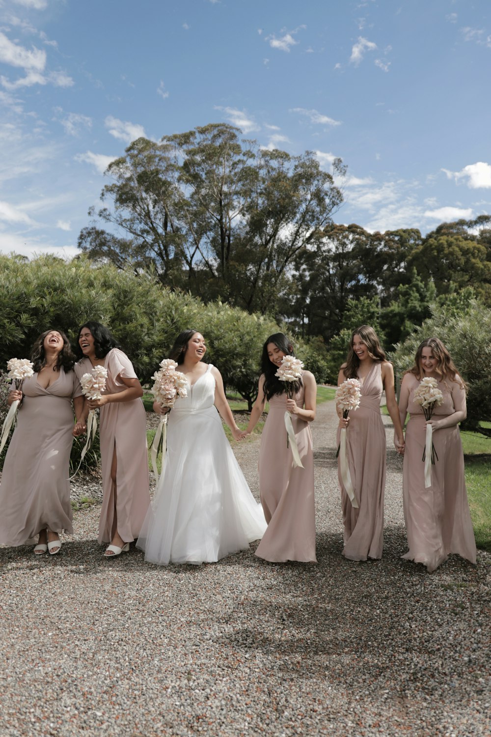 a group of women standing next to each other