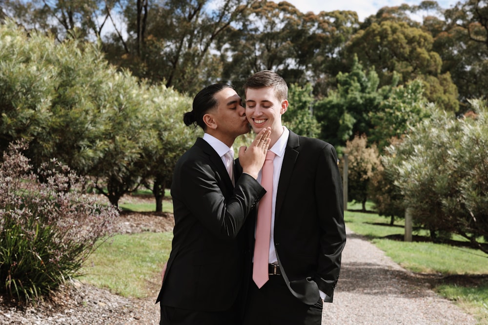 a couple of men standing next to each other