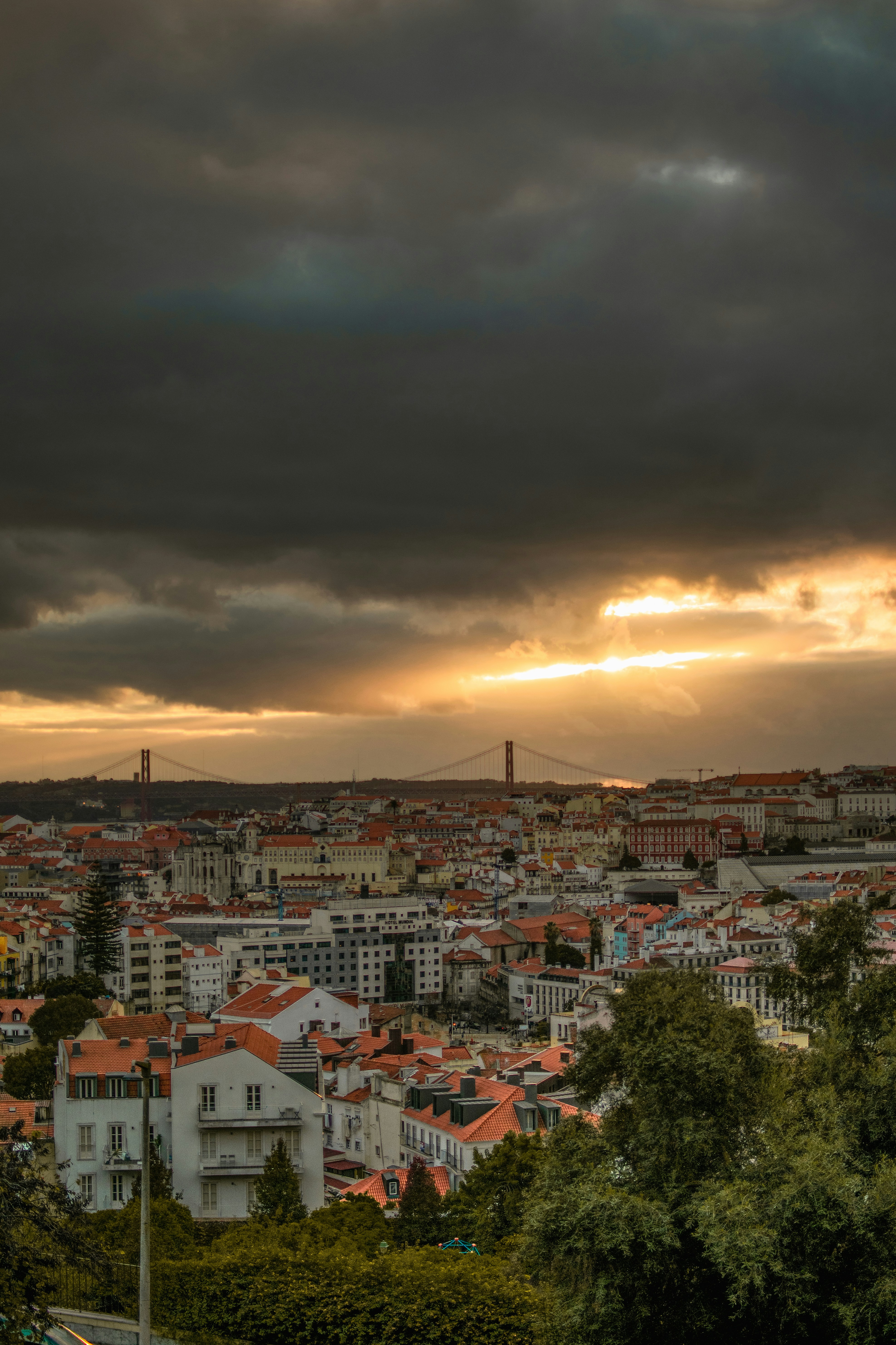 a view of a city from a hill