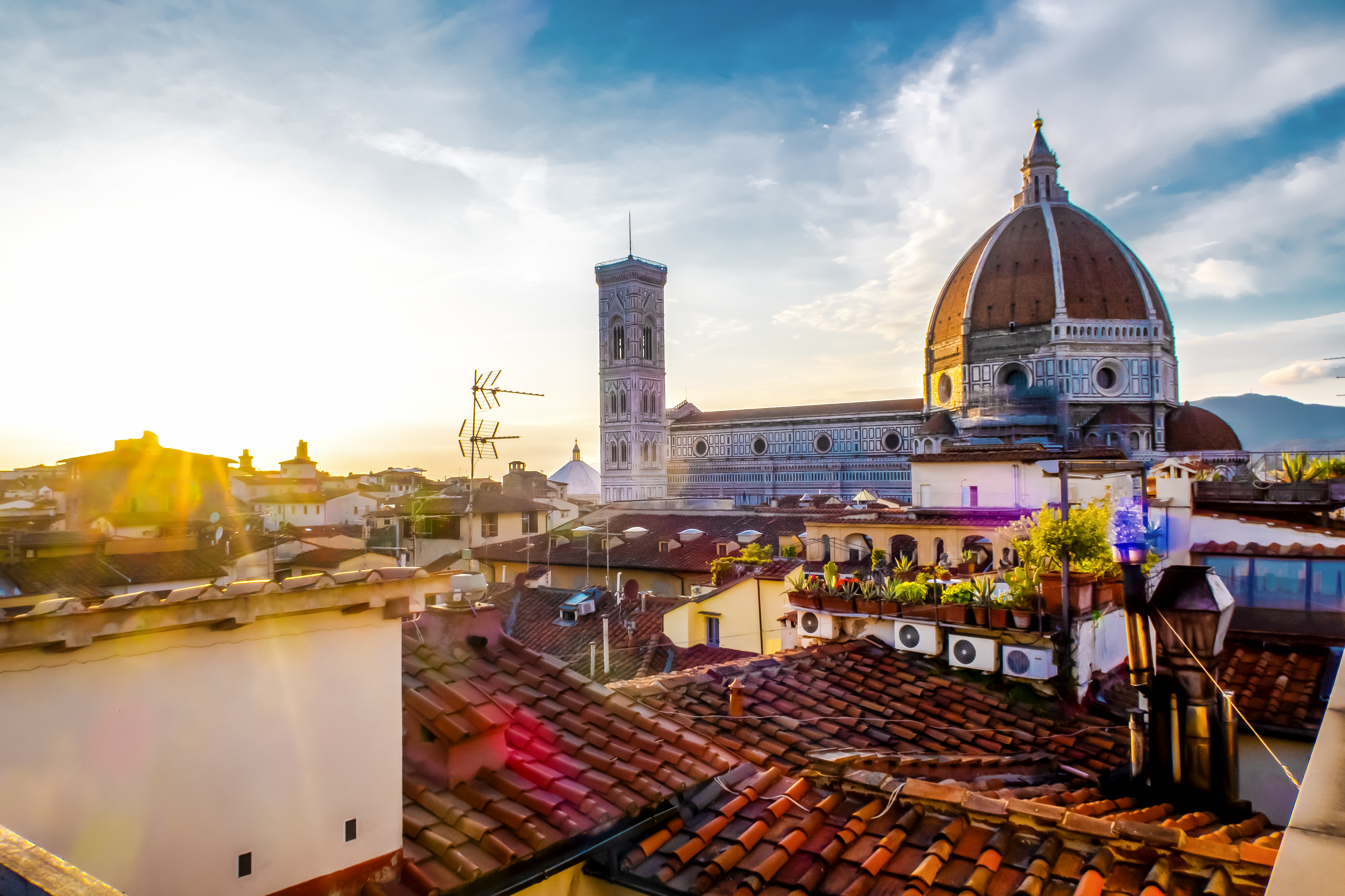 Florence Duomo and rooftops at sunset