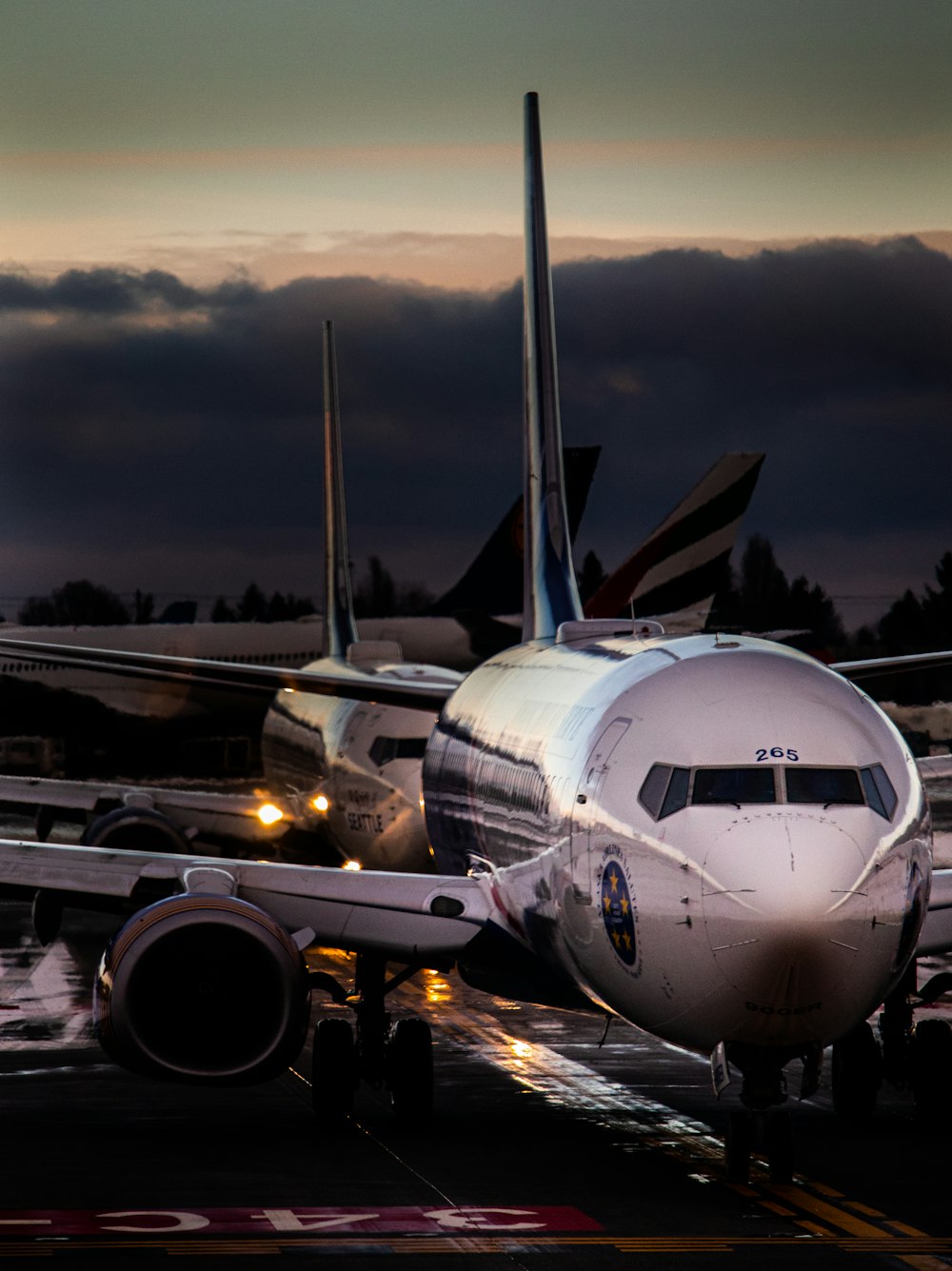 a large jetliner sitting on top of an airport tarmac