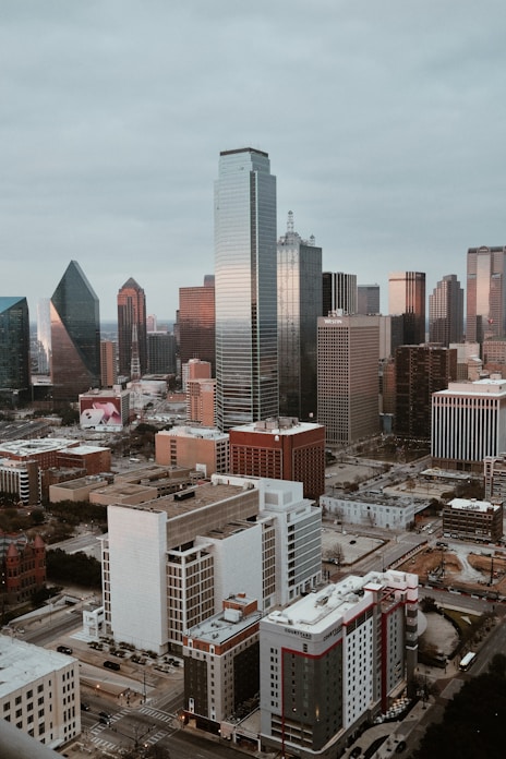 a view of a city with tall buildings