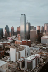a view of a city with tall buildings