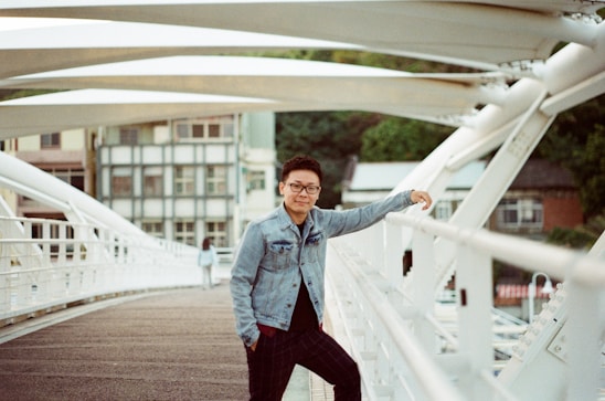 Portrait of B.C. Srivastava standing confidently at a major bridge construction site.