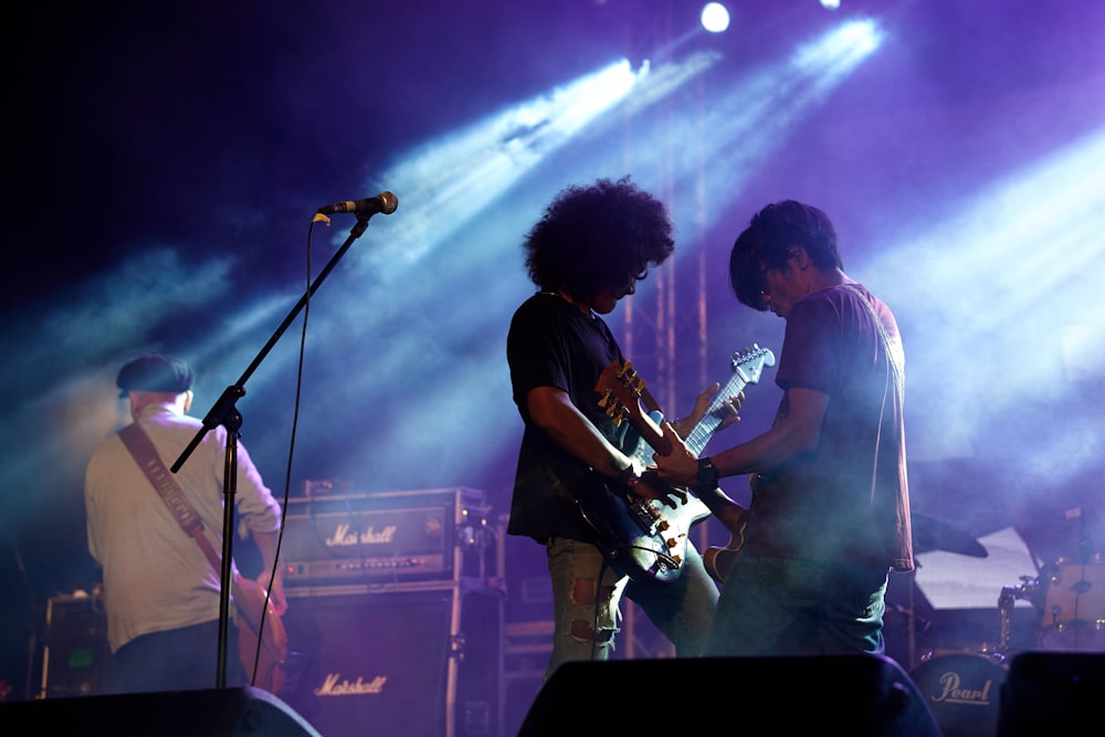 a group of people that are standing on a stage