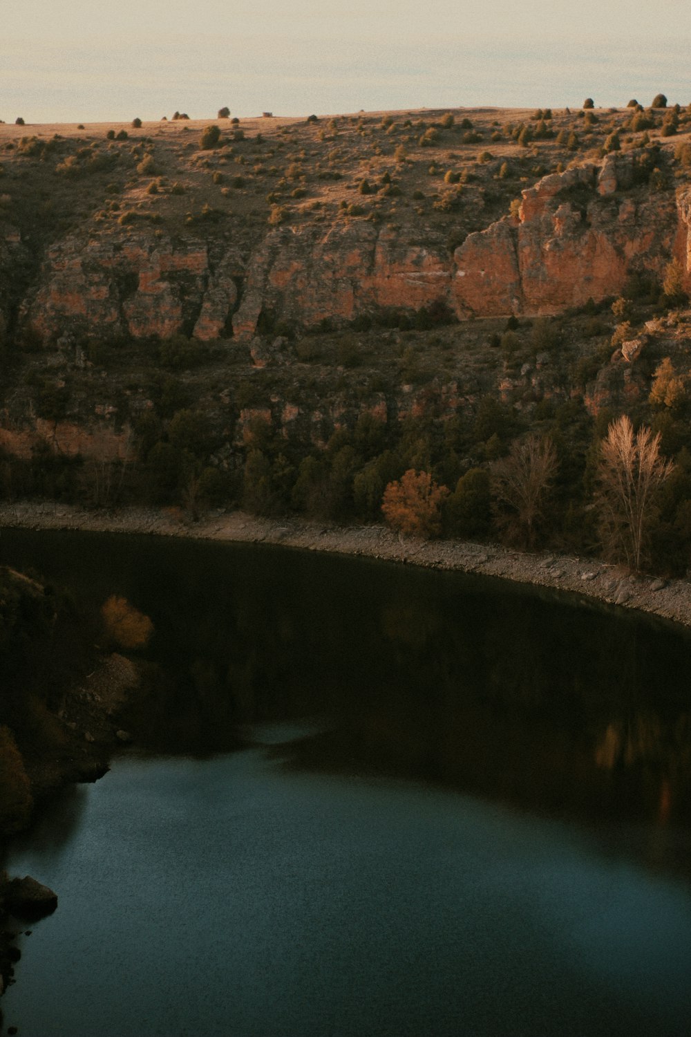 a large body of water surrounded by mountains