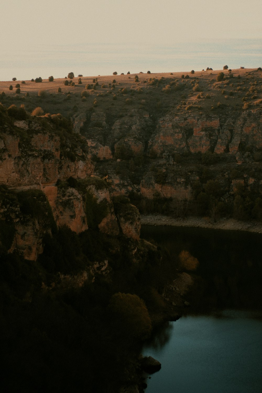 a large body of water surrounded by mountains