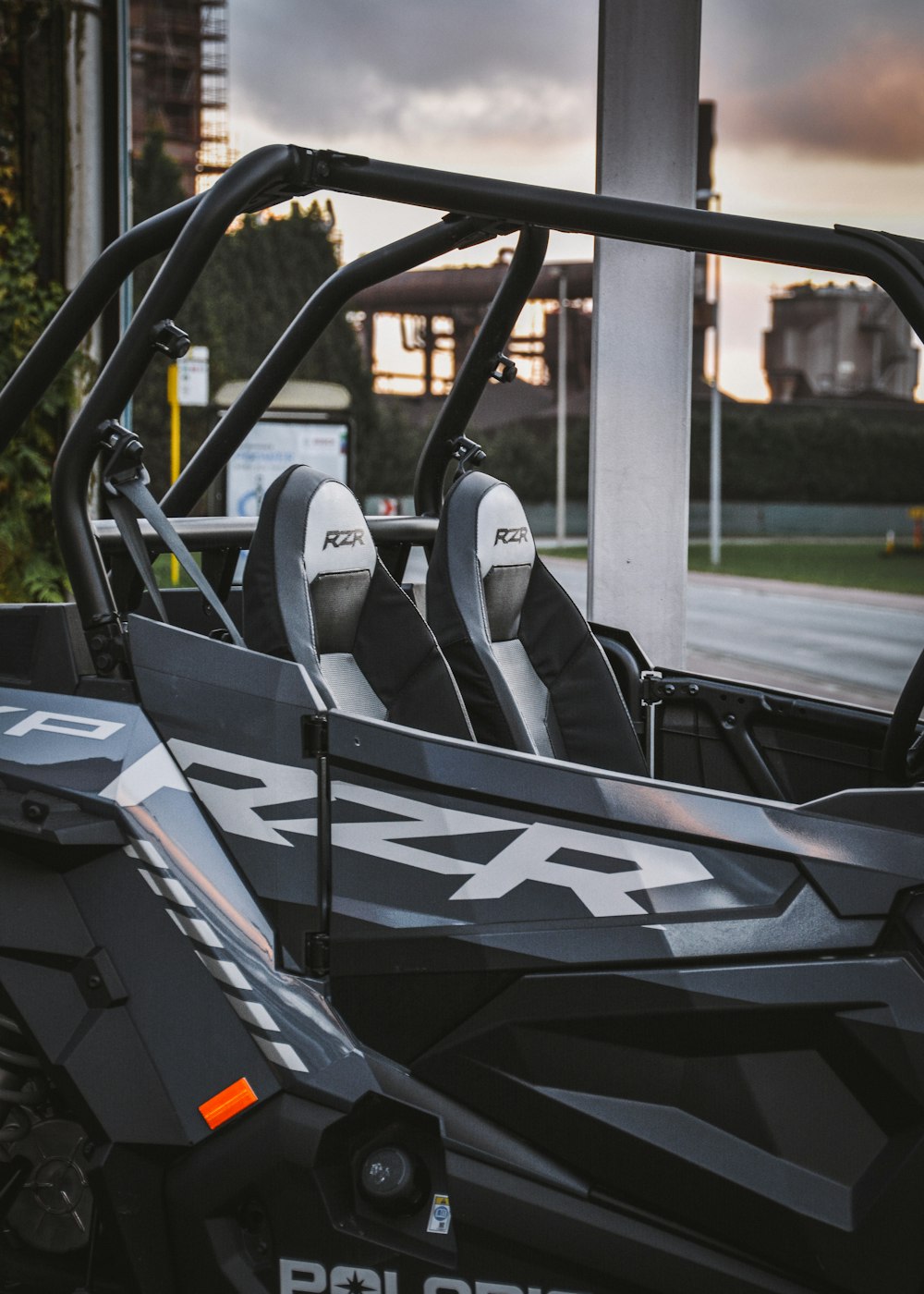 a close up of the front seats of a polaris rzr xp4