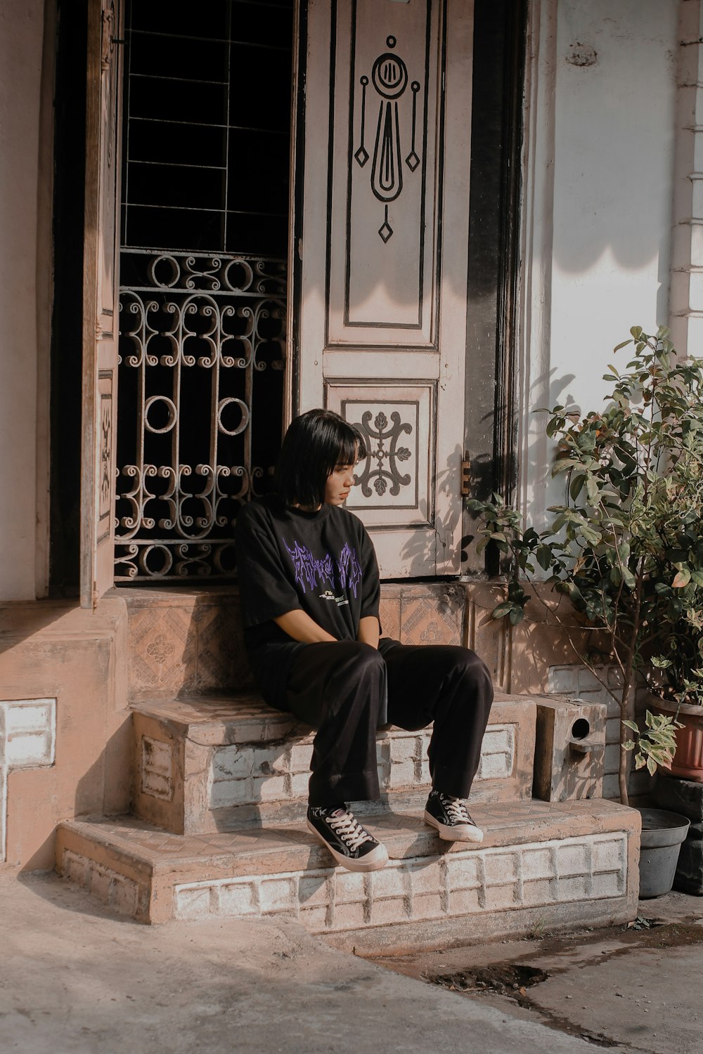 a person sitting in front of a window