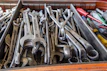 Various small car parts neatly organized in a toolbox