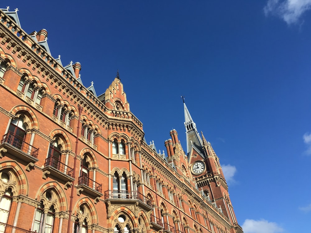 a large building with a clock on the front of it