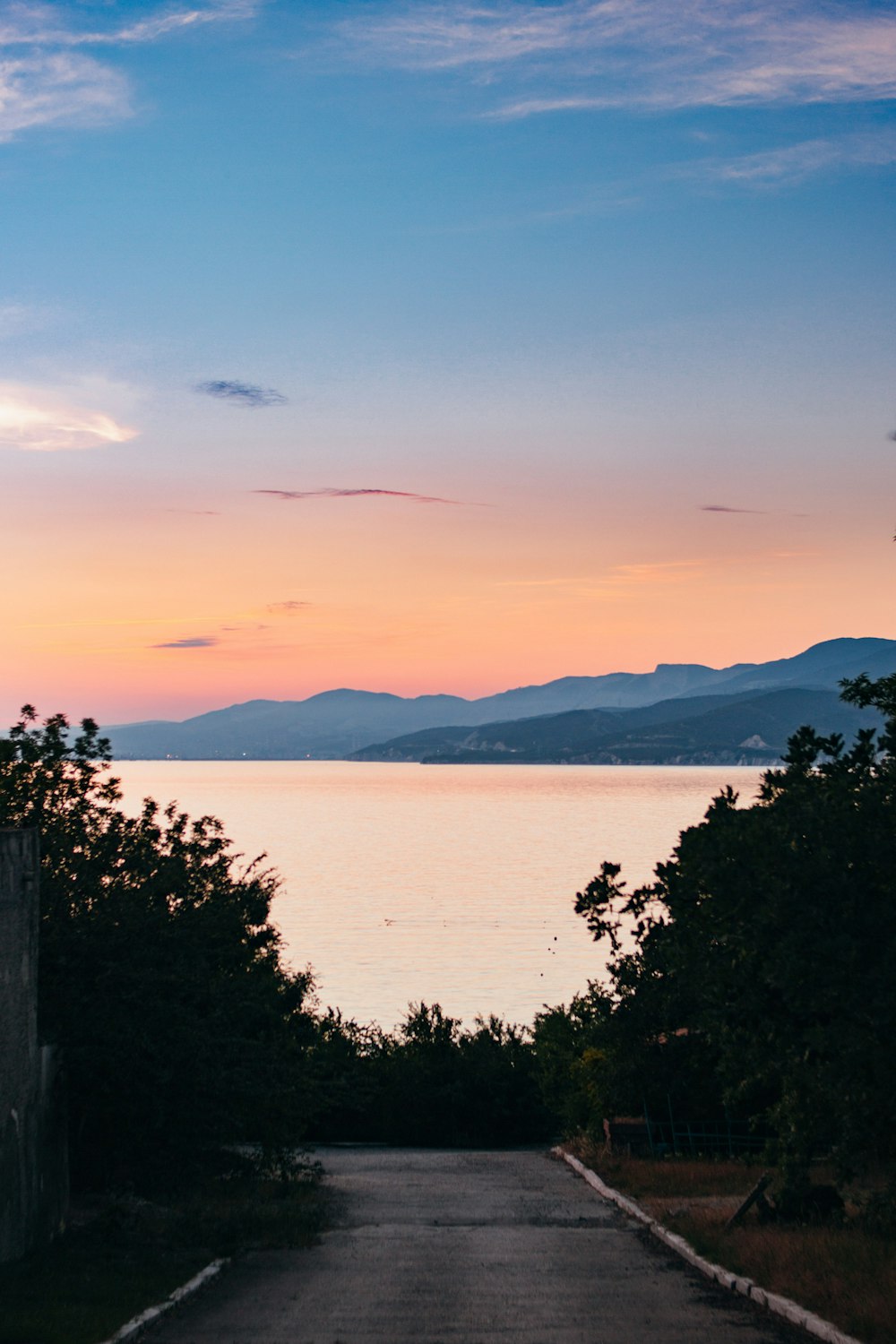 a sunset over a body of water