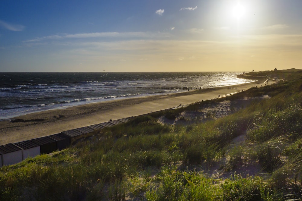 a view of a beach next to a body of water