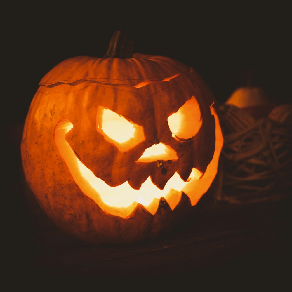 a carved pumpkin sitting on top of a table