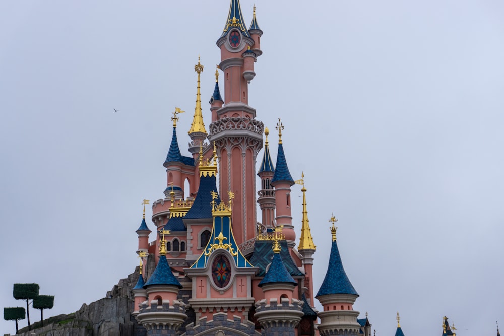 a very tall building with a clock on it's side