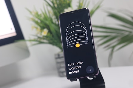 a cell phone that is sitting on a stand