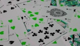 a pile of playing cards sitting on top of each other