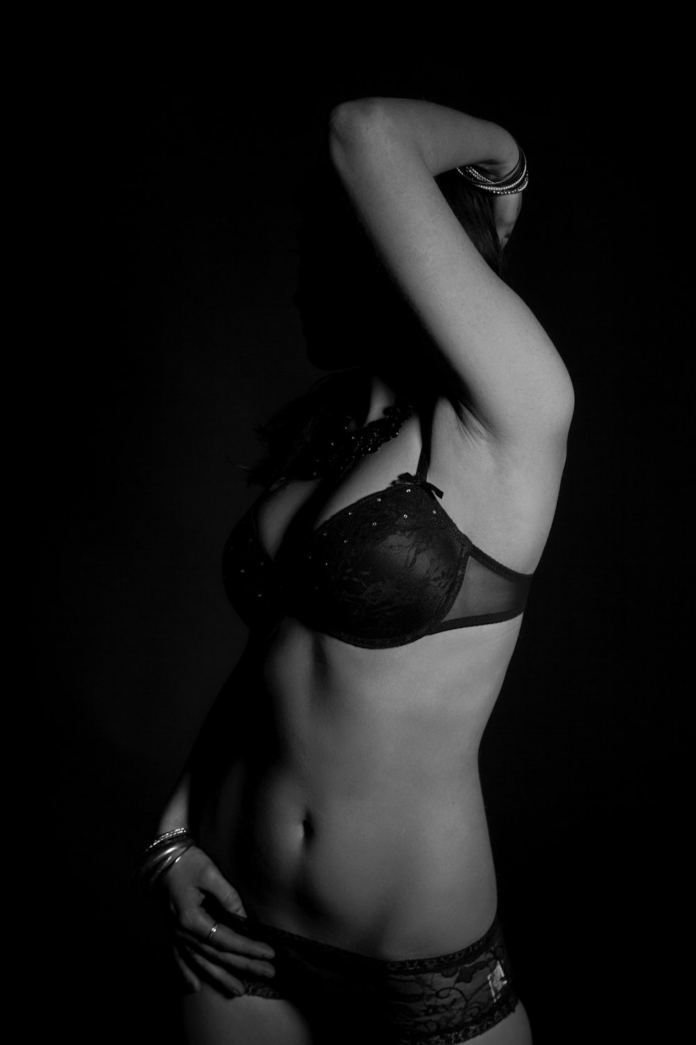 A black and white photo of a woman in lingerie photo – Clothing on Unsplash