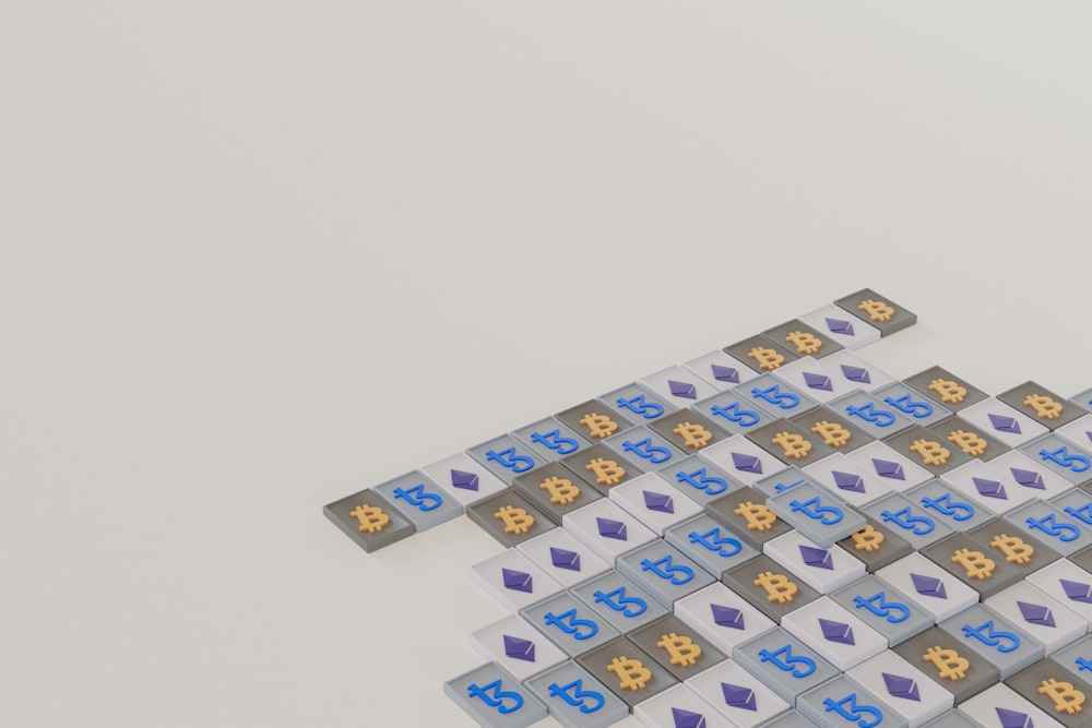 a group of blue and yellow dices sitting on top of each other