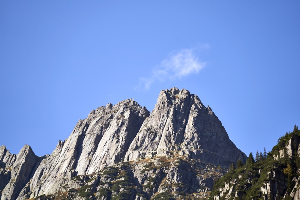 a very tall mountain with a sky background