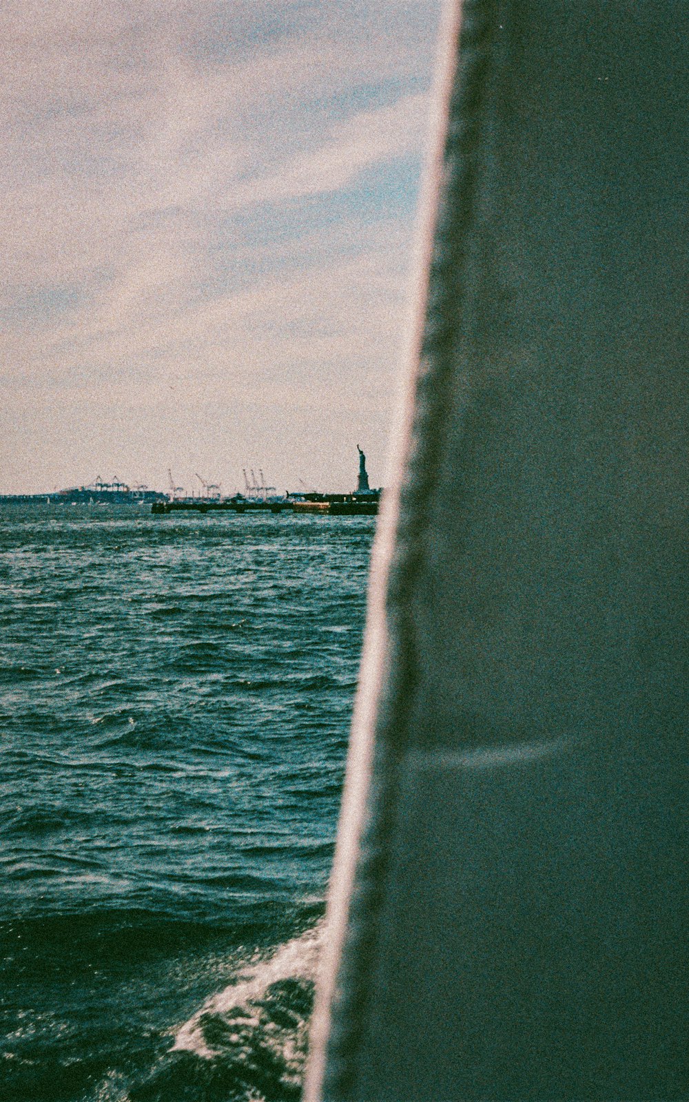 a boat traveling across a body of water