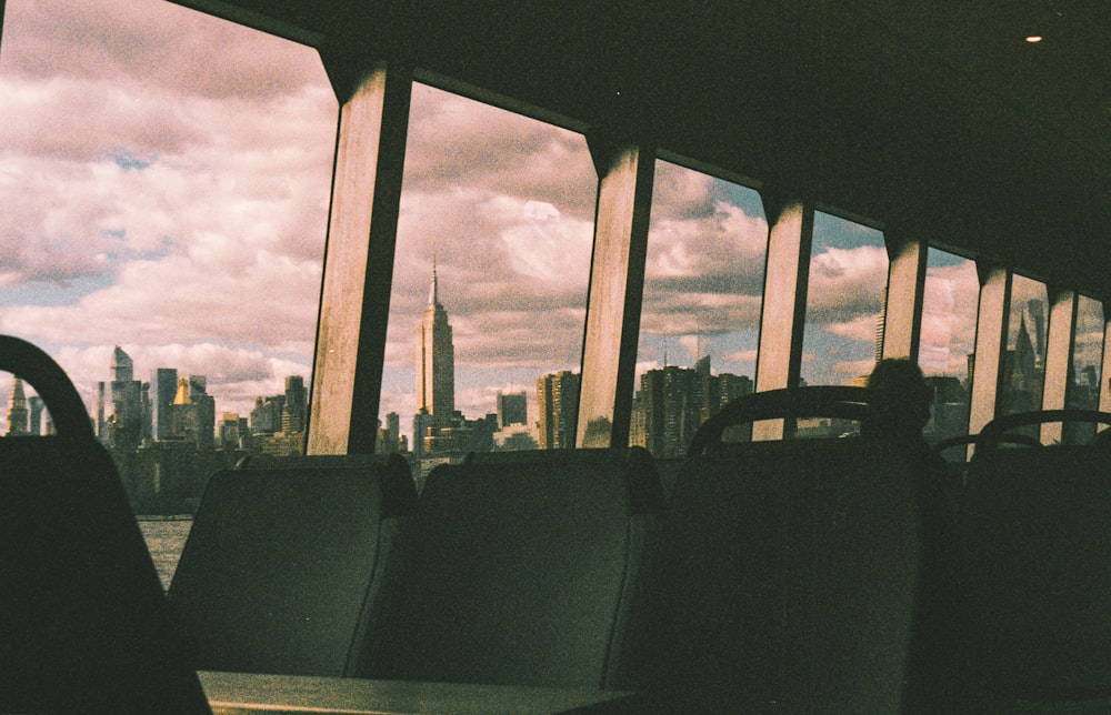 a row of seats sitting in front of a window