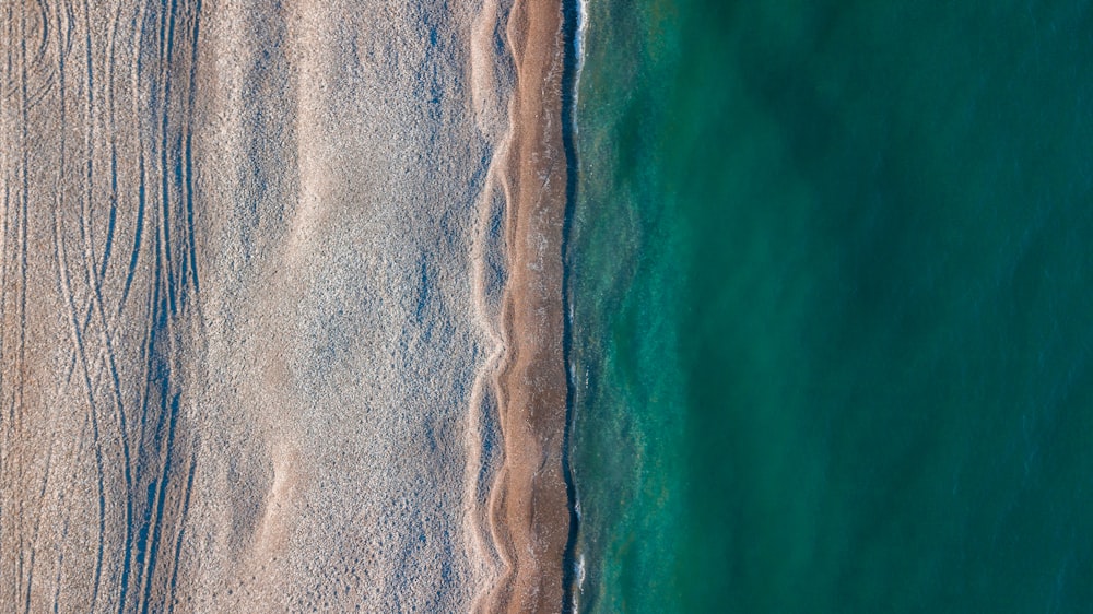 an aerial view of a beach and the ocean