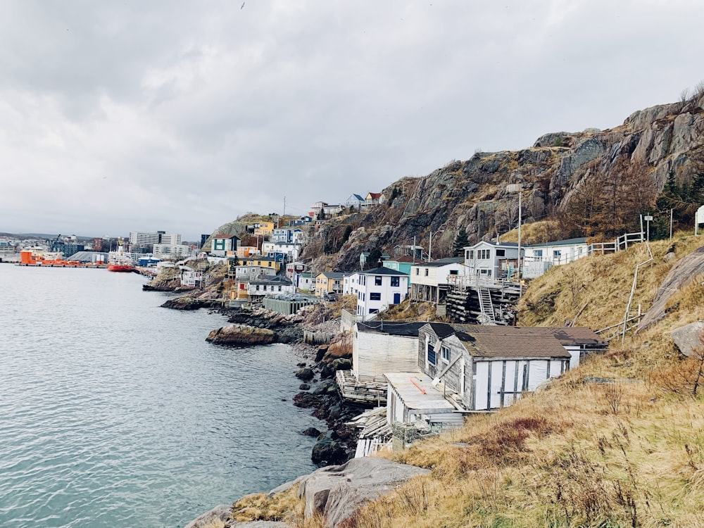 a body of water with a bunch of houses on it