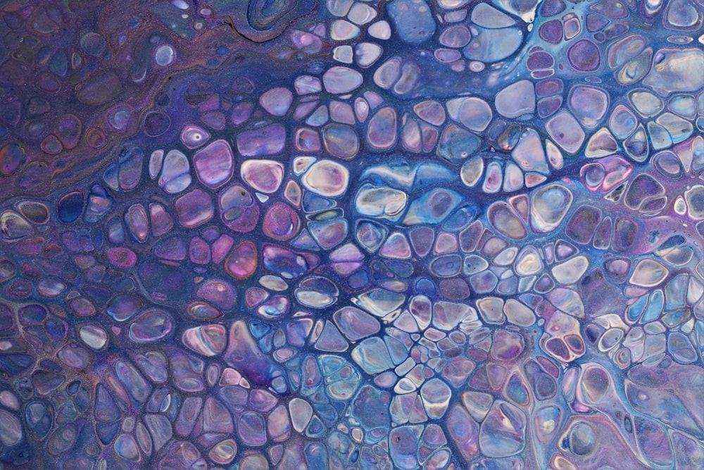an abstract painting of blue and purple bubbles