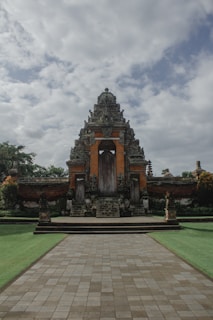 a very large building with a big door in the middle of it